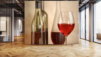 wine bottle and wine glass on a glass table Wall mural