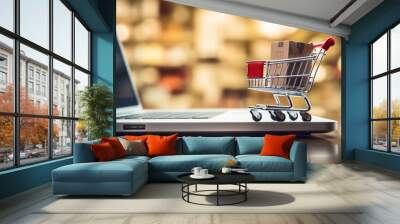 Expansive shot capturing the digital transaction process with a cashier and shopping cart on a laptop keyboard, illustrating online shopping. Wall mural