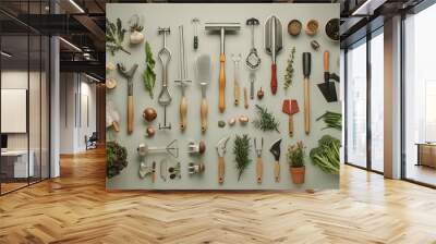 Gardening tools and succulents arranged neatly on a light background, showcasing organization, nature, and the essence of horticultural activities Wall mural