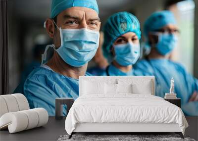 Group of medical professionals in scrubs with confident expressions in a hospital setting Wall mural