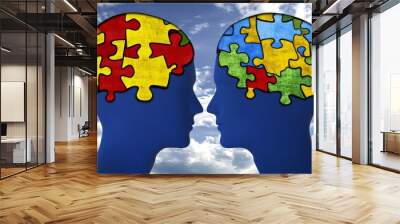 Illustration of two heads made of puzzle pieces facing each other with bold primary colors symbolizing the playful yet complex nature of human thought and communication Wall mural