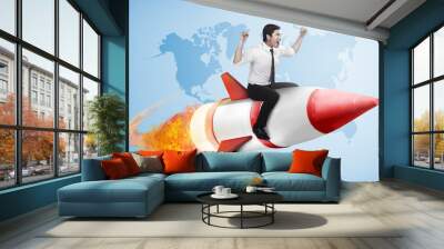 asian business man flying ride rocket Wall mural