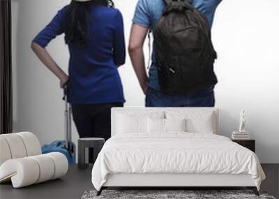 Back view of asian couple traveling together with baggage Wall mural