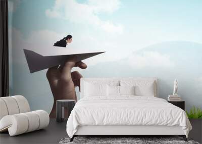 business woman ready to launch with paper plane Wall mural