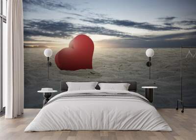 Heart on the sand with a dramatic sky background Wall mural