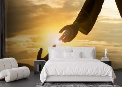 Silhouette of Jesus giving helping hand Wall mural