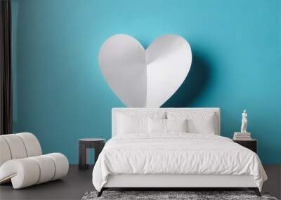 white paper heart against blue background Wall mural