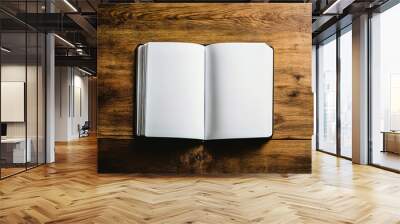 Top view flat lay of the inside of an A4 book with white pages, placed open on a dark brown wooden coffee table. Wall mural