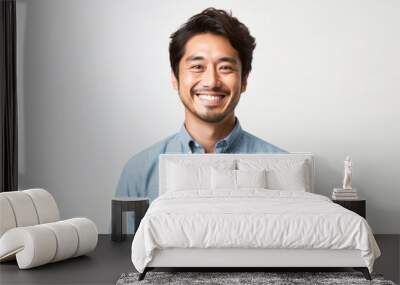 portrait of a Japanese man in his 30s wearing a foulard against a white background Wall mural