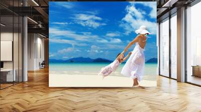 woman and girl on the beach Wall mural