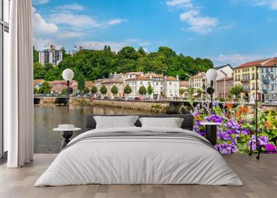 Flowers on a bridge across the Moselle River in Epinal, France Wall mural