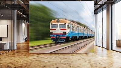 suburban electric train on a blurred background Wall mural