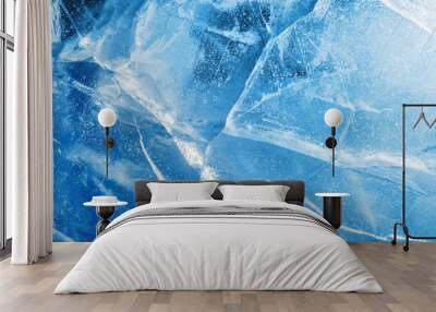 Abstract ice background. Blue background with cracks on the ice surface Wall mural