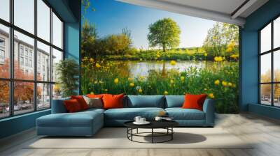 Spectacular meadow with big tree, fresh green leaves. Wall mural