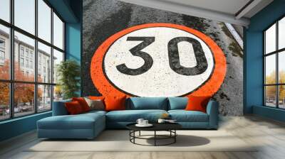 speed limit of 30 km/h,  traffic sign painted on an asphalted roadway Wall mural