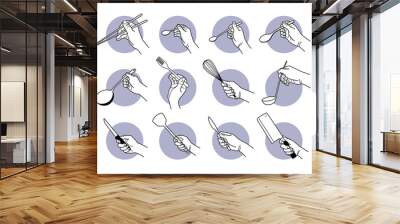 Hand holding kitchen utensils and cooking tools. Vector illustrations of a hand holding chopsticks, spoon, fork, whisk, knife, and spatula. Wall mural