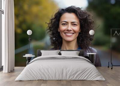 Middle aged Hispanic woman smiling, close up street portrait Wall mural