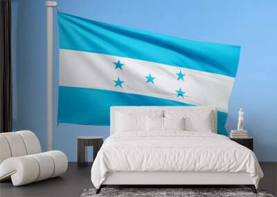 Honduras flag on stick on sky background. Realistic flag illustration Wall mural