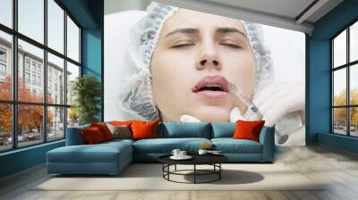 young girl in a clinic contour lips procedure Wall mural