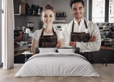 Small business owner, successful young baristas standing in front of their cafe Wall mural