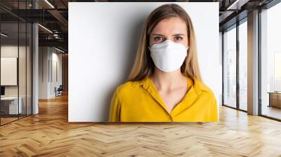 Virus mask woman wearing face protection in prevention for coronavirus Wall mural