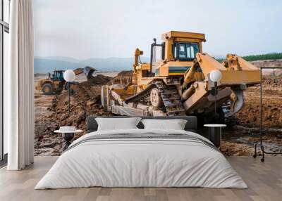  Bulldozer and front loader rake the ground Wall mural