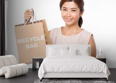 asian woman finger point to shopping bag and showing phrase of r Wall mural