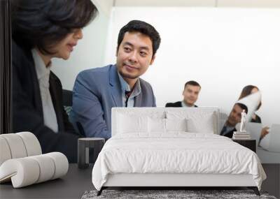 Business people discuss in conference room Wall mural