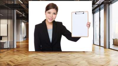 Businesswoman showing with the blank screen of clipboard Wall mural