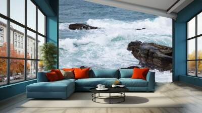 Sea ocean wave over the rocky stone Wall mural