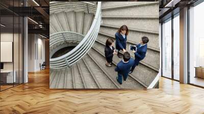 top view of business people standing at the steps Wall mural