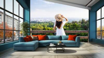 Woman enjoy the scenery view Wall mural