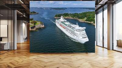 The cruise ferry is departing from Helsinki and moving near the Suomenlinna island, Finland. Wall mural