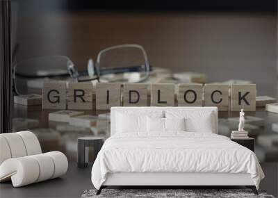 The concept of Gridlock represented by wooden letter tiles Wall mural