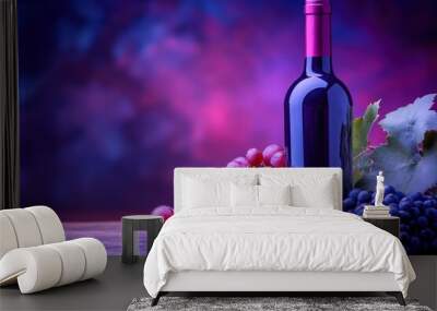 A bottle of red wine with red and blue grapes on a wooden table against a blurred purple background. Wall mural