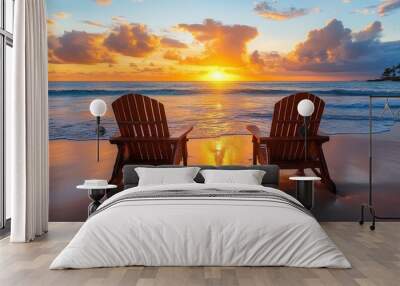 Two wooden chairs facing the ocean at sunset. Wall mural