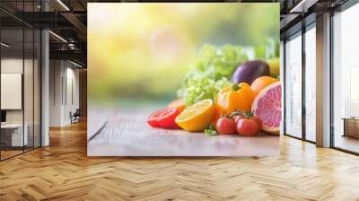 A close-up view of fresh fruits and vegetables beautifully arranged in a colorful, balanced layout on a wooden table, symbolizing healthy gut nutrition.  Wall mural