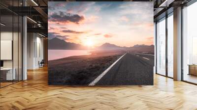 Lake and road  at sunset Wall mural