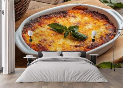 Eggplant Parmigiana, a classic Italian dish featuring layers of breaded eggplant slices baked with marinara sauce and melted cheese, offering a rich and savory flavor. Wall mural