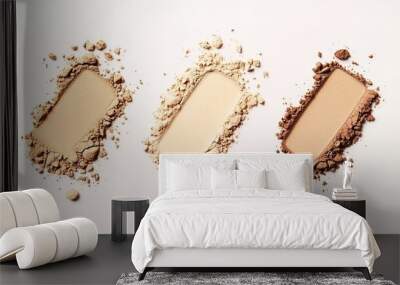 Flat Lay of Four Different Shades of Foundation on a White Background: Featuring One Lightest Shade in the Center and Three Medium Tones on Either Side. The Powder is Spread Out in an Aesthetically Pl Wall mural