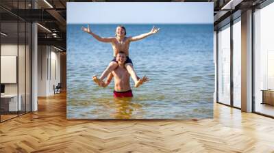 happy little boys in the sea Wall mural