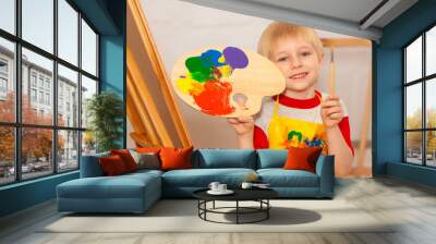 Little boy with easel in art school Wall mural