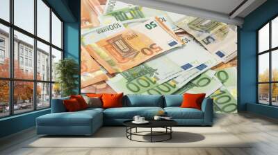 Background of dollar, euro banknotes on a table Wall mural