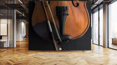 old Violin with bow on a wooden table Wall mural