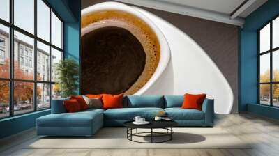 cup of coffee on a brown background Wall mural