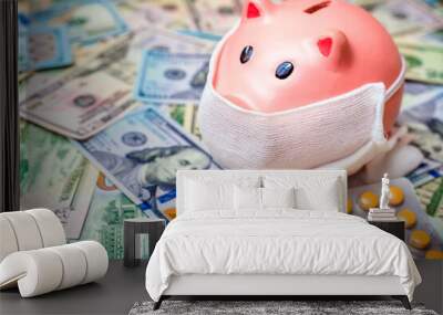 piggy bank in a mask on a background of american currency.The concept of coronavrius epidemic
 Wall mural