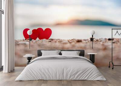 romantic symbol of two hearts on the beach  Wall mural