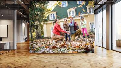 Happy family have fun at front of back yard. On the move. Wall mural