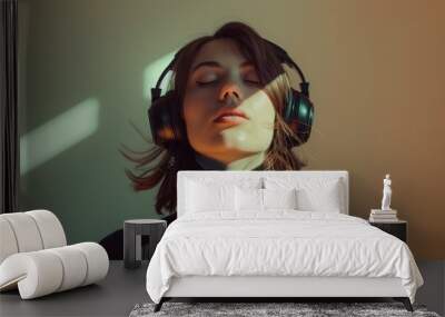 Beauty woman with headphones in soft and plain brown background Wall mural