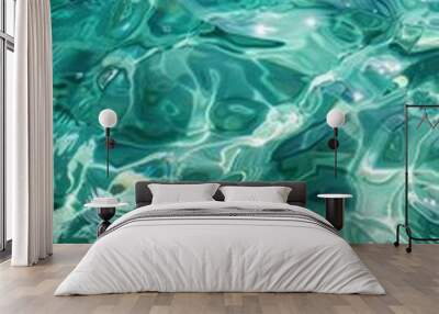 Top view of calm and clean blue and green water with reflections of the sun Wall mural